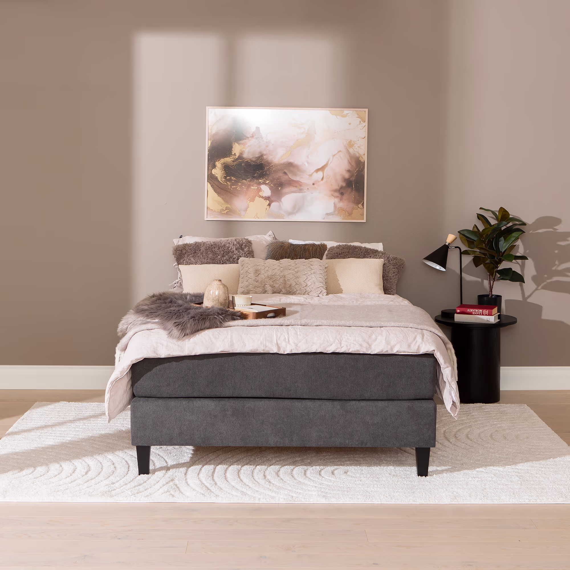 Side view of Moon Gold continental bed featuring the Primo 96 anthracite upholstery and sturdy oak-stained wooden legs