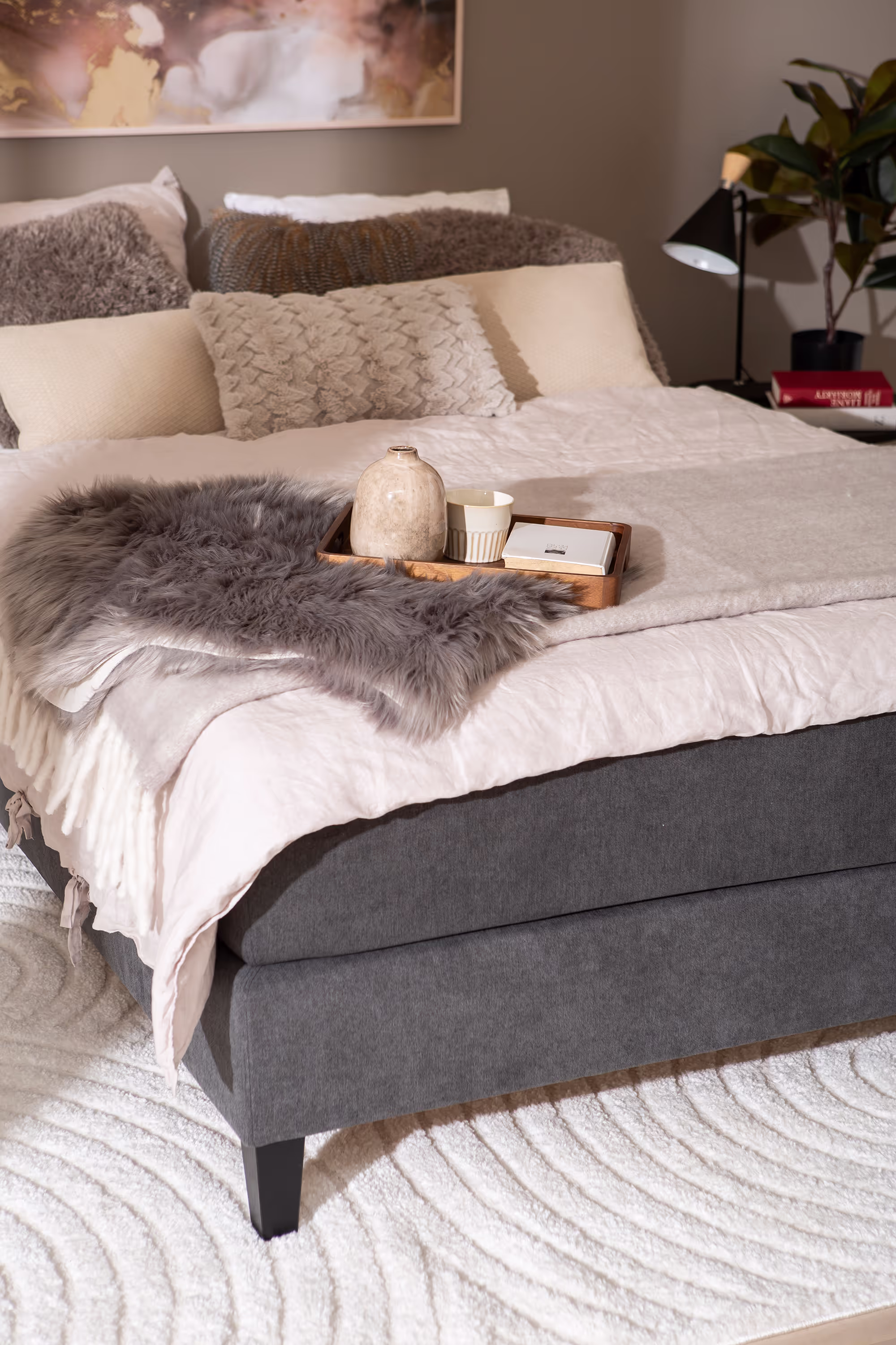 The Moon Gold bed in a bedroom setting, illustrating timeless elegance and a cozy atmosphere.