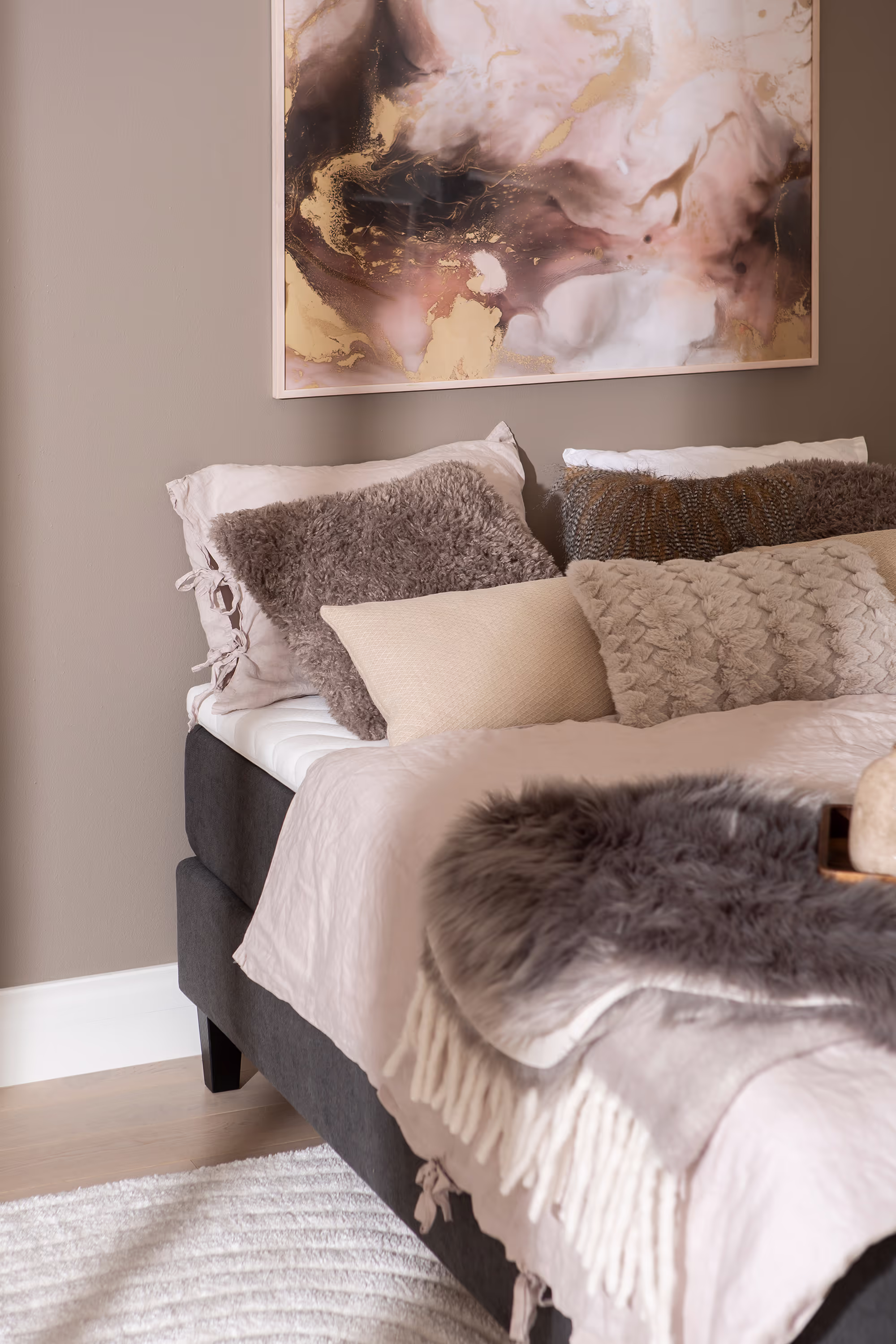 The Moon Gold continental bed without headboard, highlighting its minimalist and adaptable design.