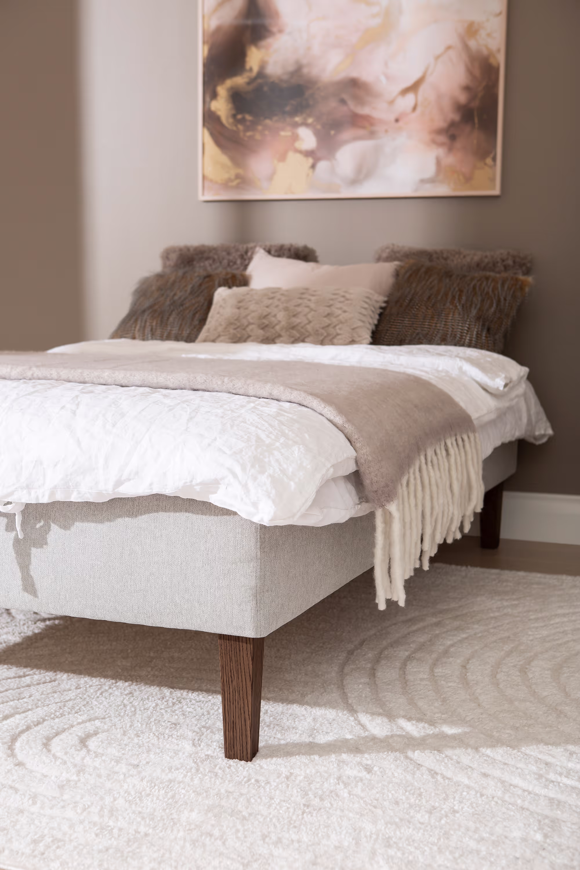 Side profile of the Moon Silver divan bed 120x200 cm highlighting the 5-zone pocket spring mattress and smooth fabric