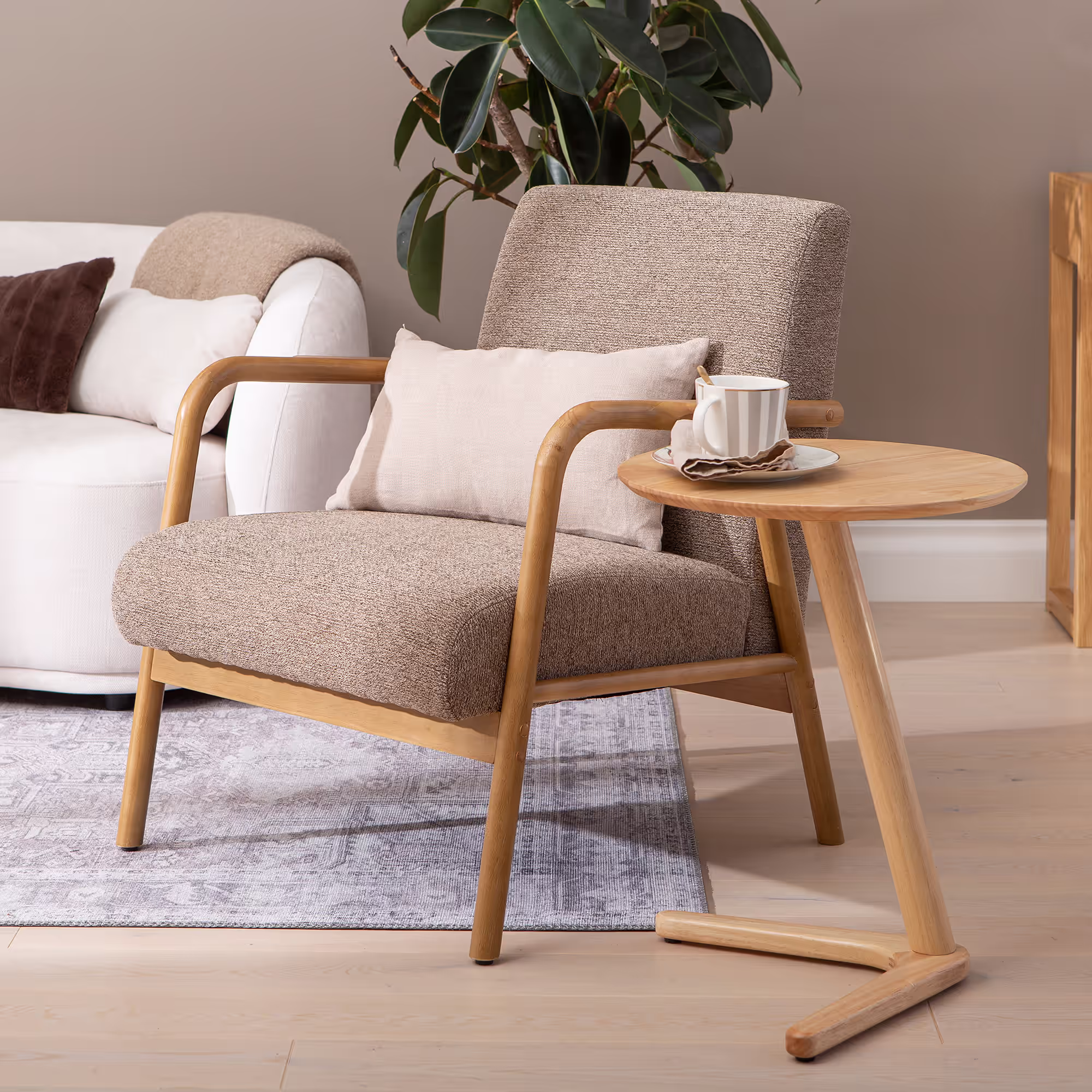 Detailed shot of rounded edges on Dove armchair’s rubberwood frame