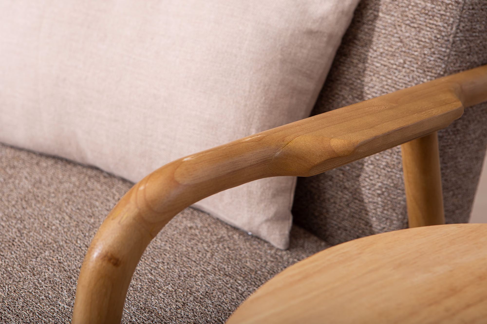 Dove armchair positioned in a modern living space with neutral décor