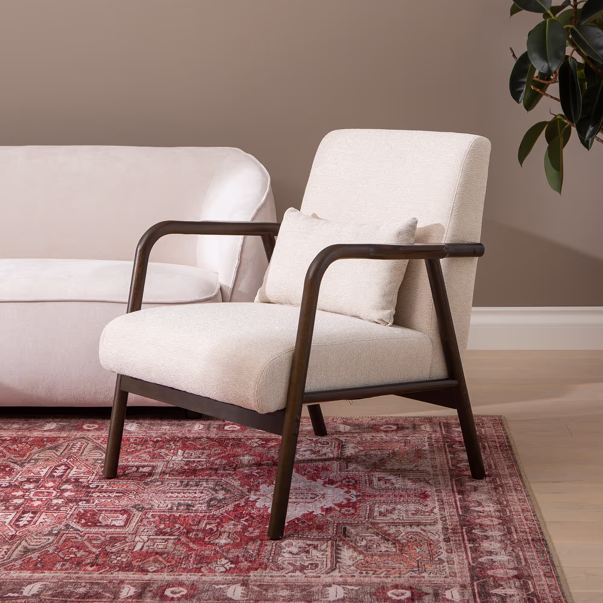 Walnut wood frame legs and base of Dove armchair