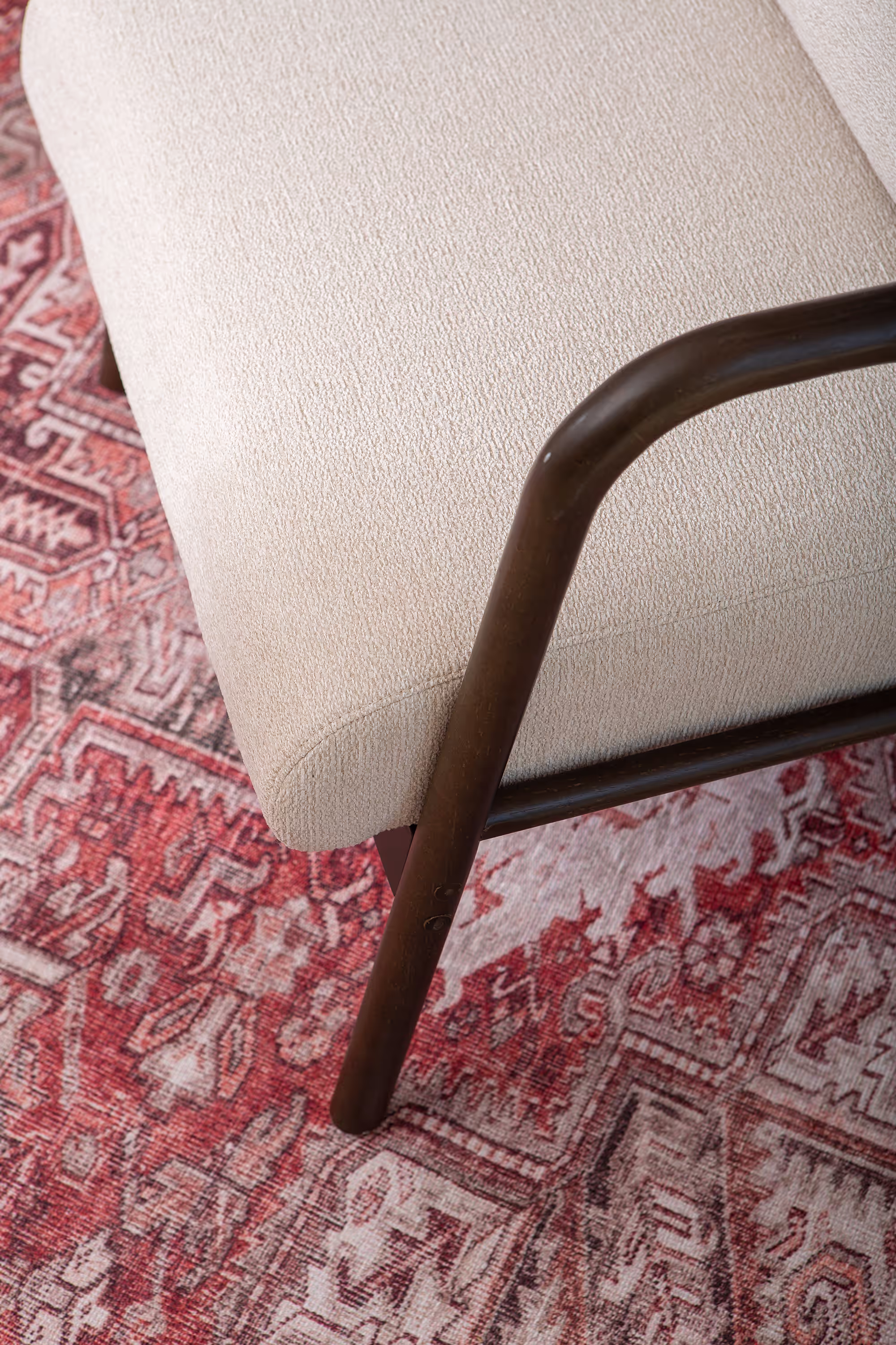 Close-up of armrest and seam details on Dove armchair
