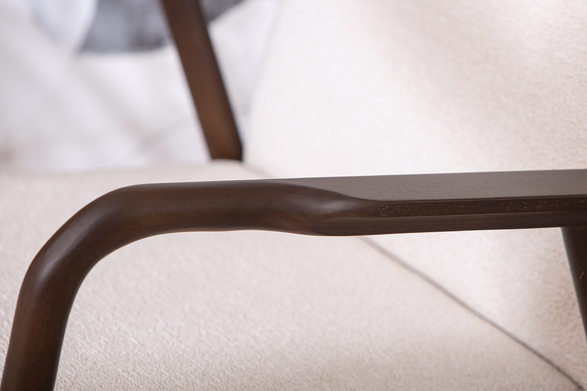 Perspective shot of Swan rocking chair emphasizing quality craftsmanship and stylish form.