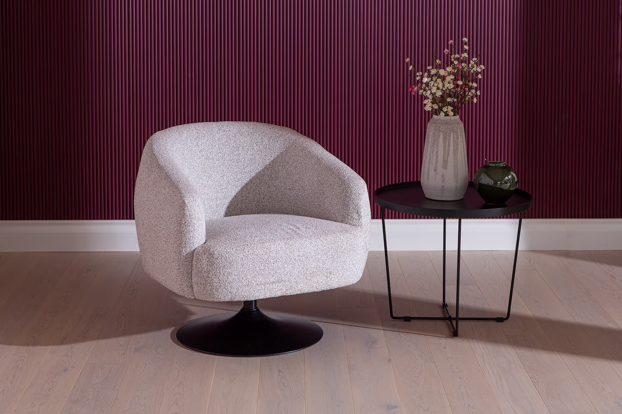Rear view of Bay armchair emphasizing Scandinavian design lines