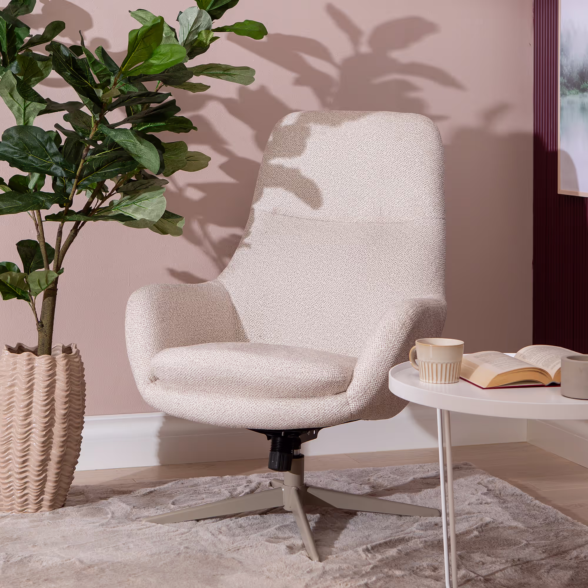Blow TV chair demonstrating swivel movement with latte legs on smooth floor