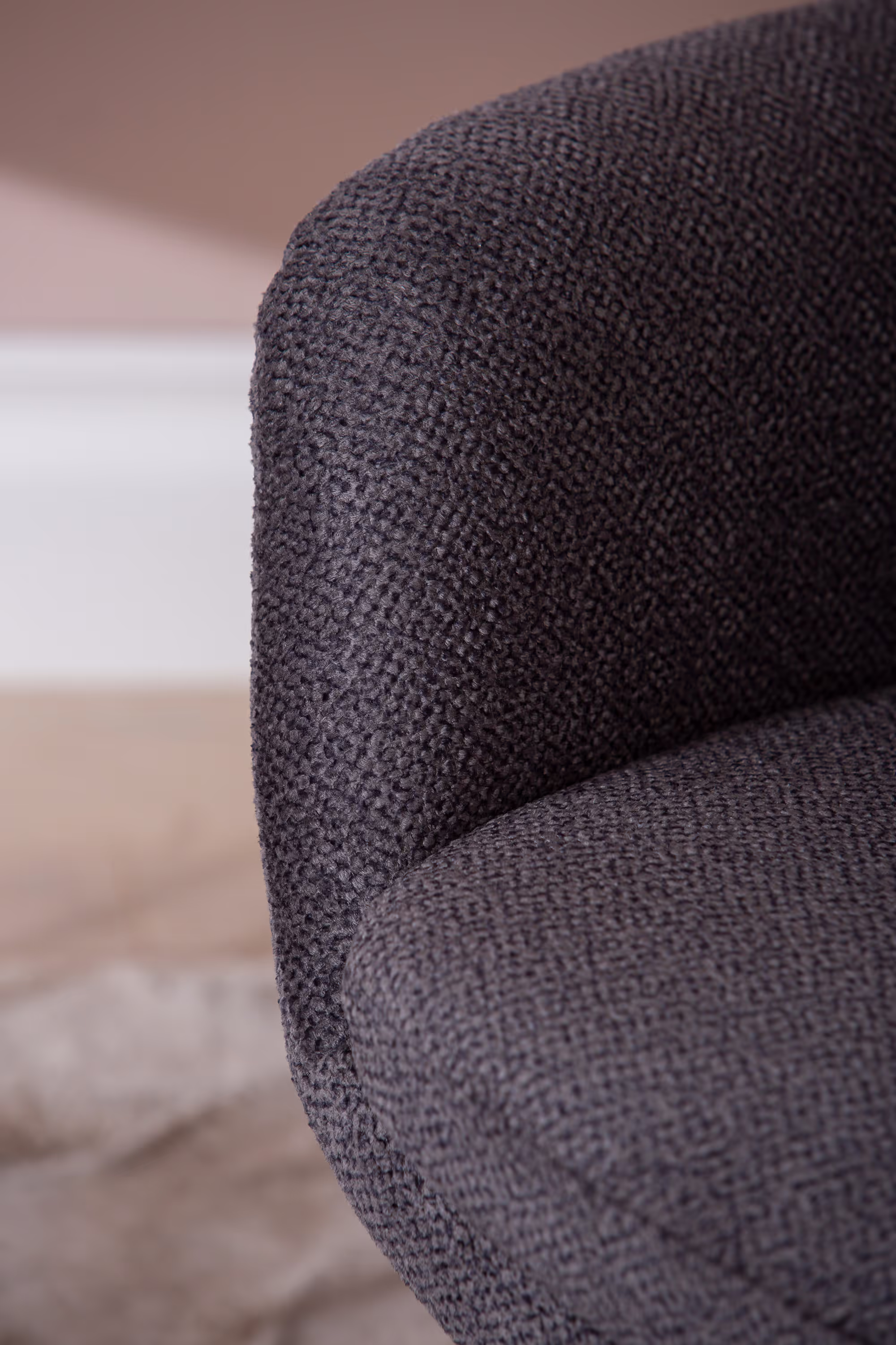 Blow TV chair black metal swivel leg base seen from front angle