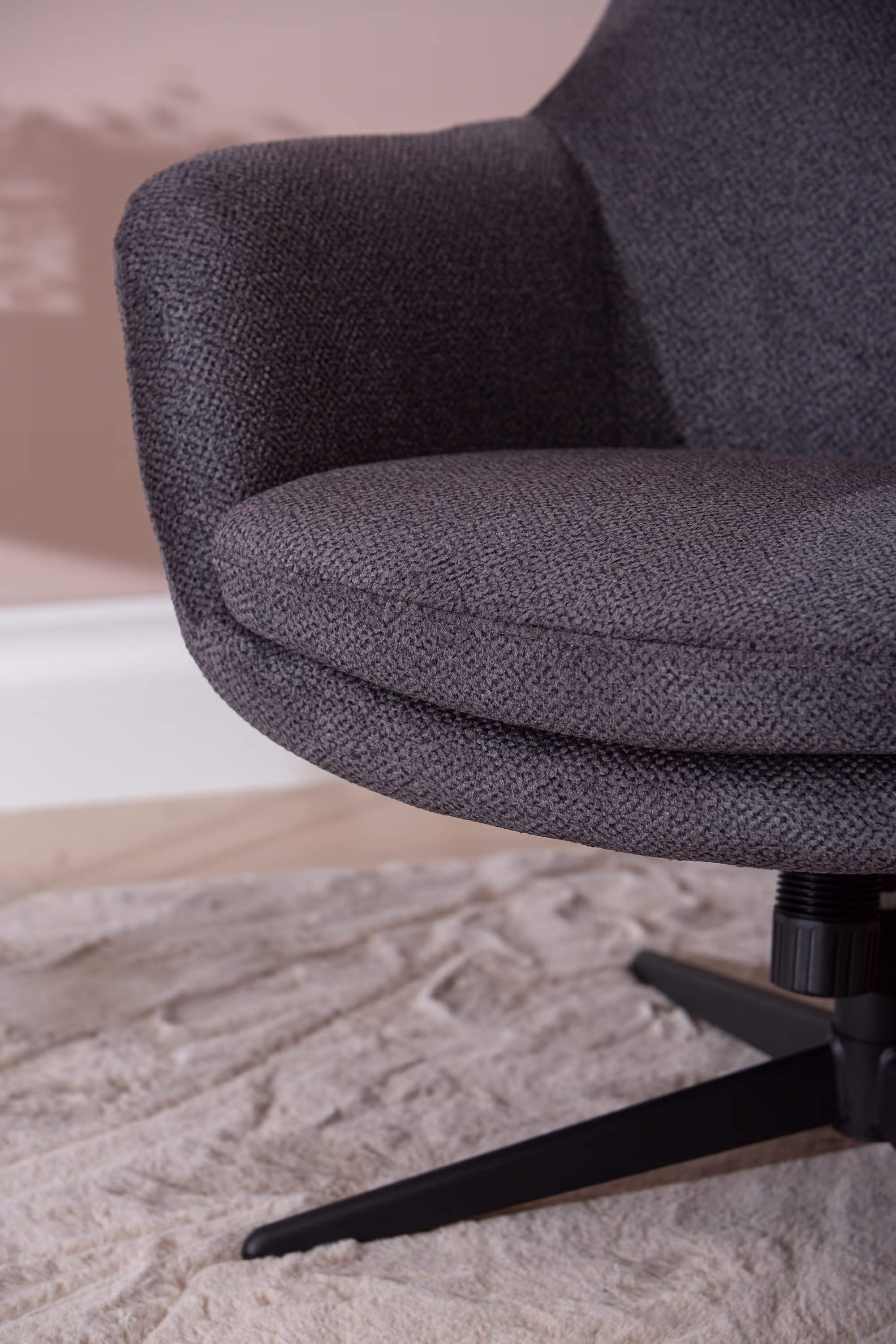 Top view of the Blow TV chair seat cushion and armrests in dark gray fabric
