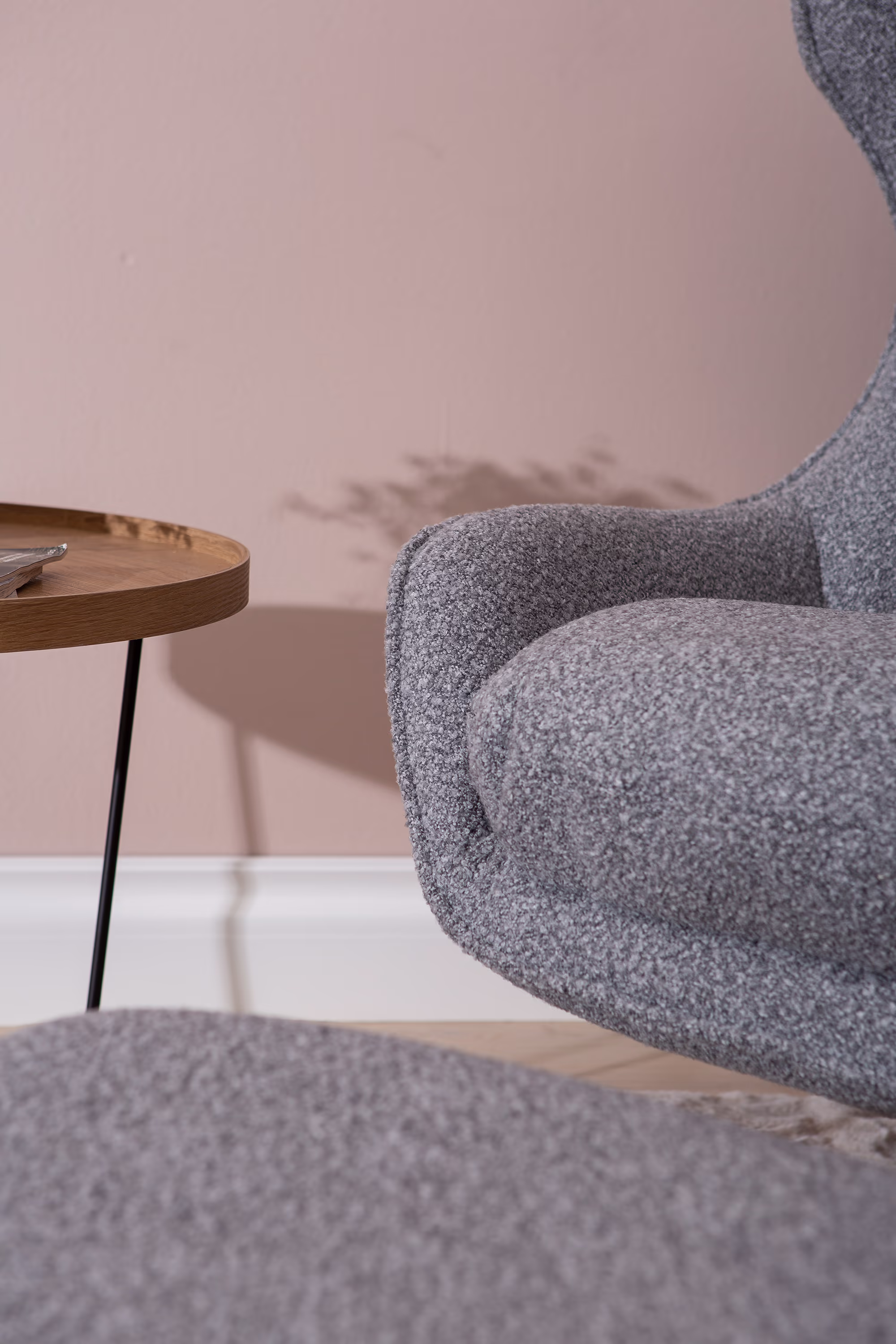 Back view of Breeze TV chair highlighting sleek black legs and ergonomic design
