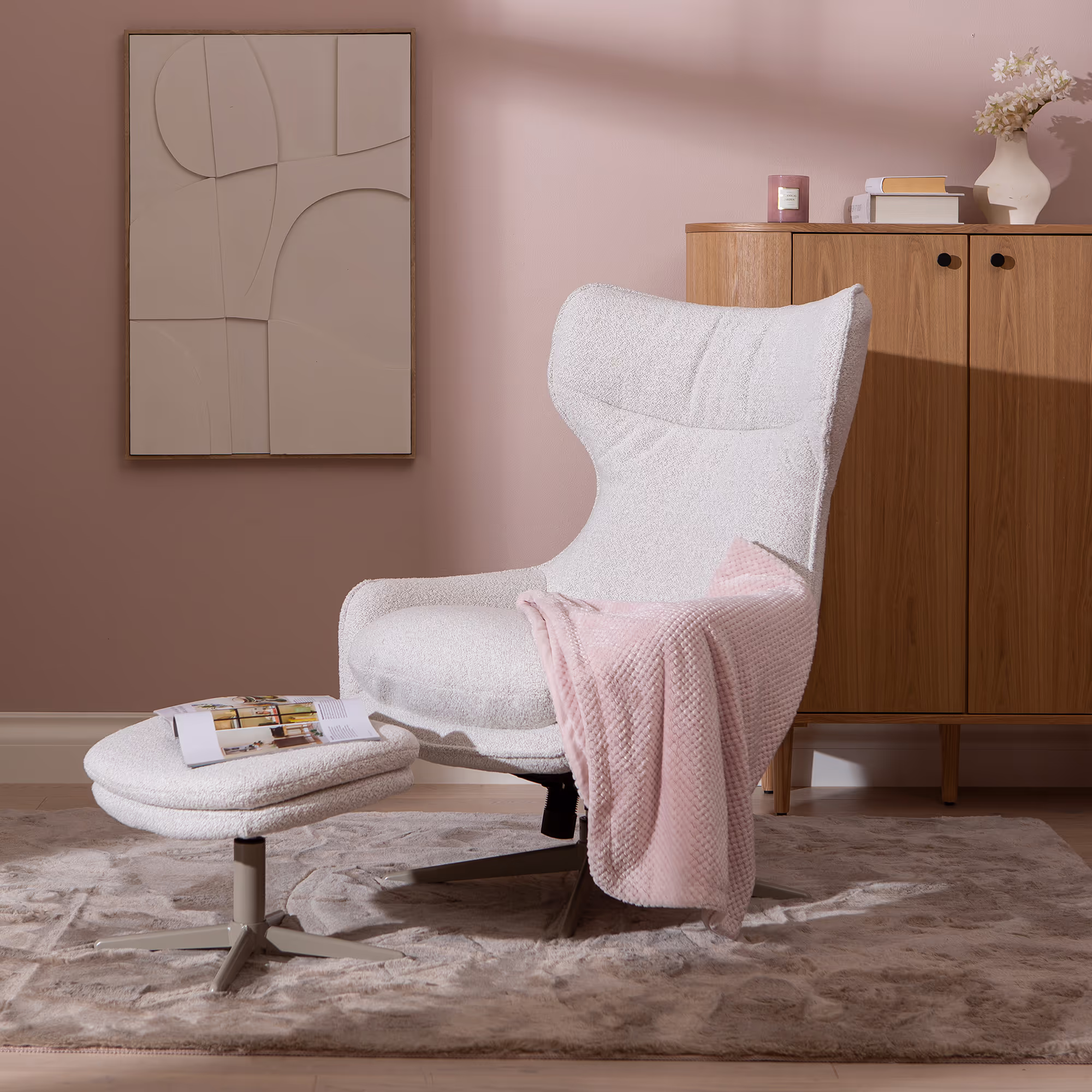 Side view of the Breeze TV chair showing soft, textured beige fabric upholstery and smooth, light latte legs.