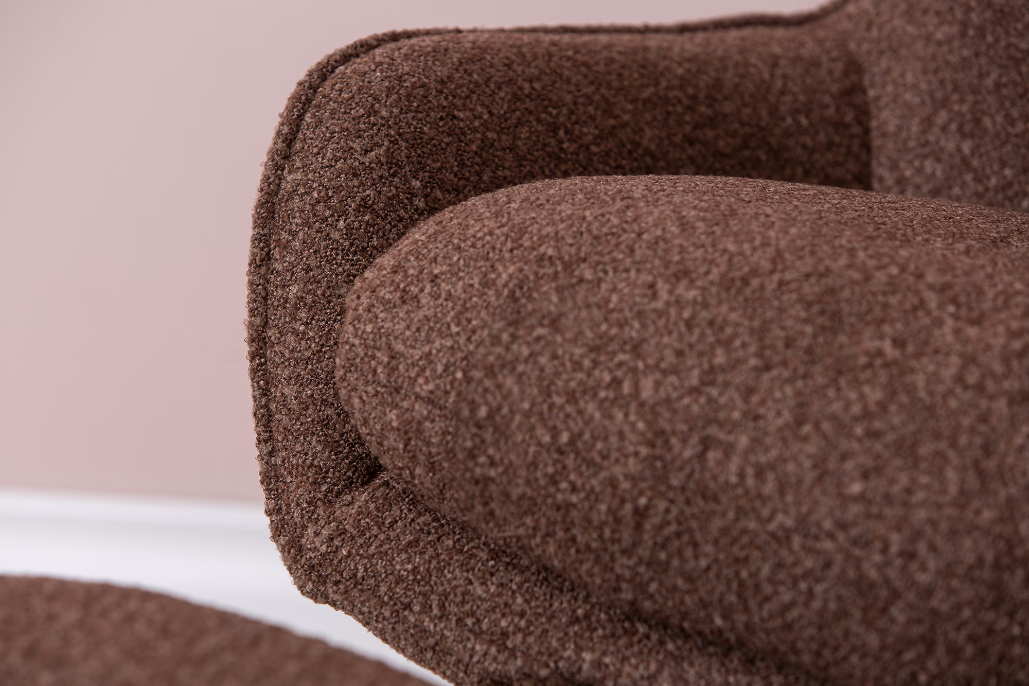 Side view of the Breeze TV chair paired with matching ottoman in brown fabric and black legs.