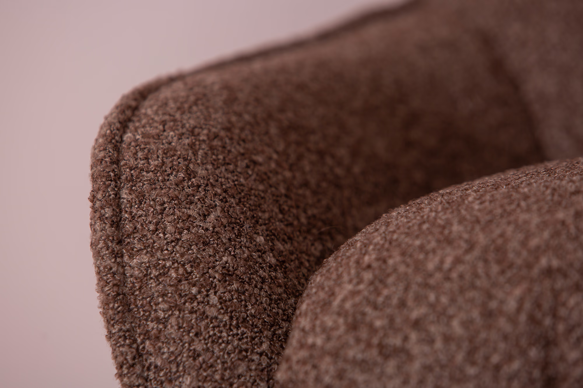 Breeze TV chair ottoman close-up emphasizing fabric softness and sturdy black legs.