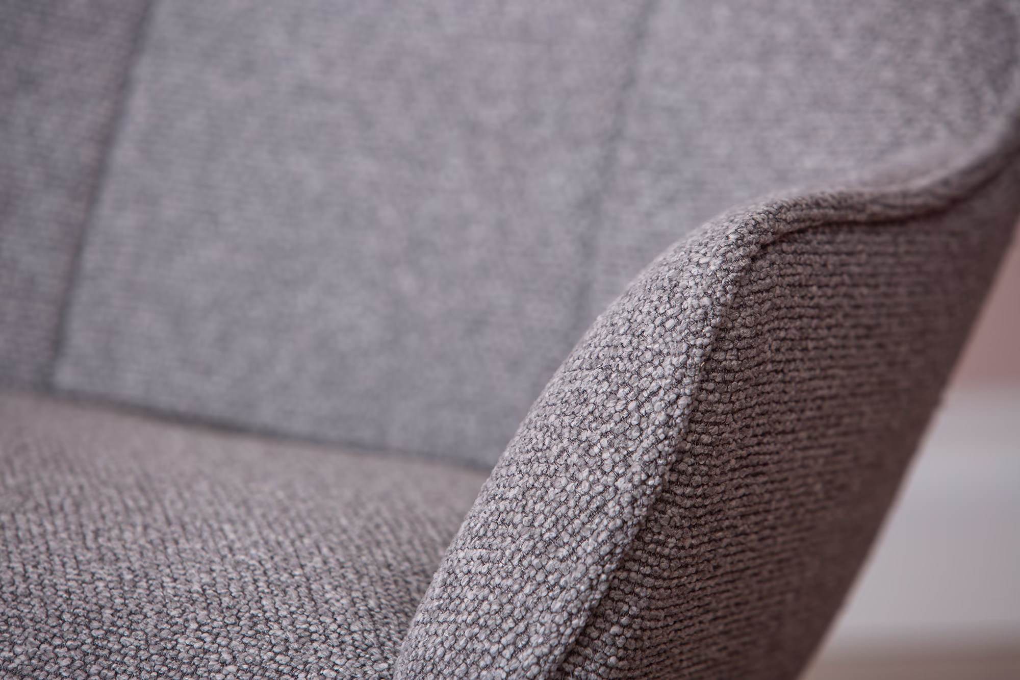 Wind TV chair with ottoman featuring matte black legs and ergonomic design