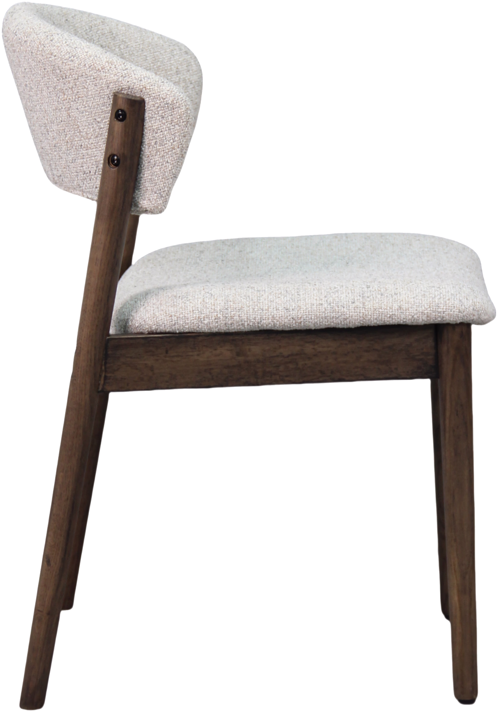 Niela chair styled in a modern dining room setting with smoked oak table, emphasizing natural tones