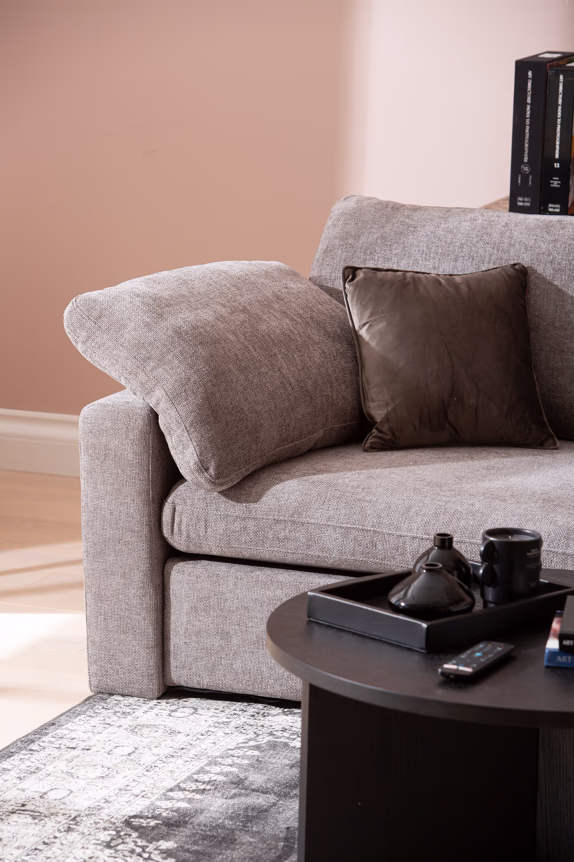 Heaven grey sofa styled with neutral throw pillows enhancing its modern look.