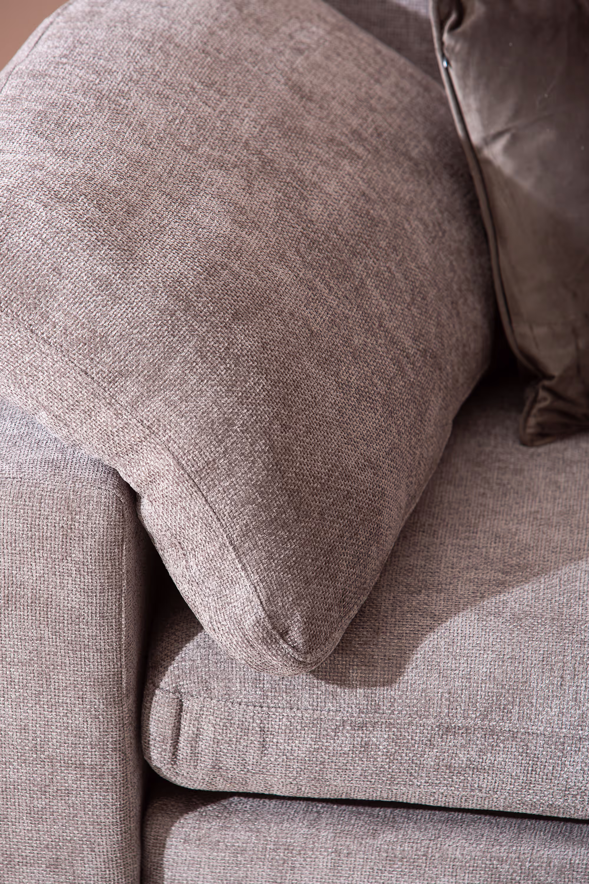 Heaven chaise sofa in grey fabric showcasing sturdy, low-profile wooden legs.