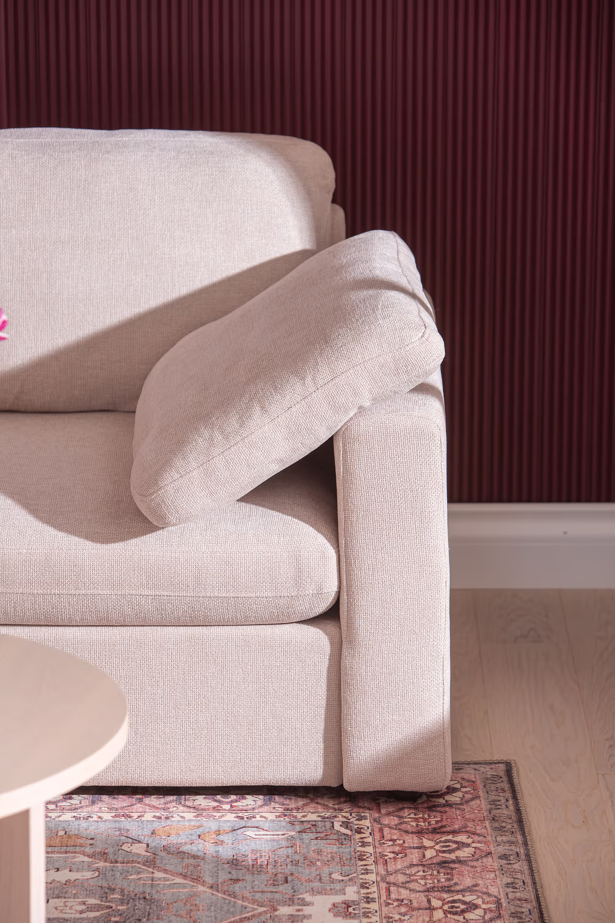 Close-up of the soft textile fabric of the Heaven 4-seat sofa in beige color