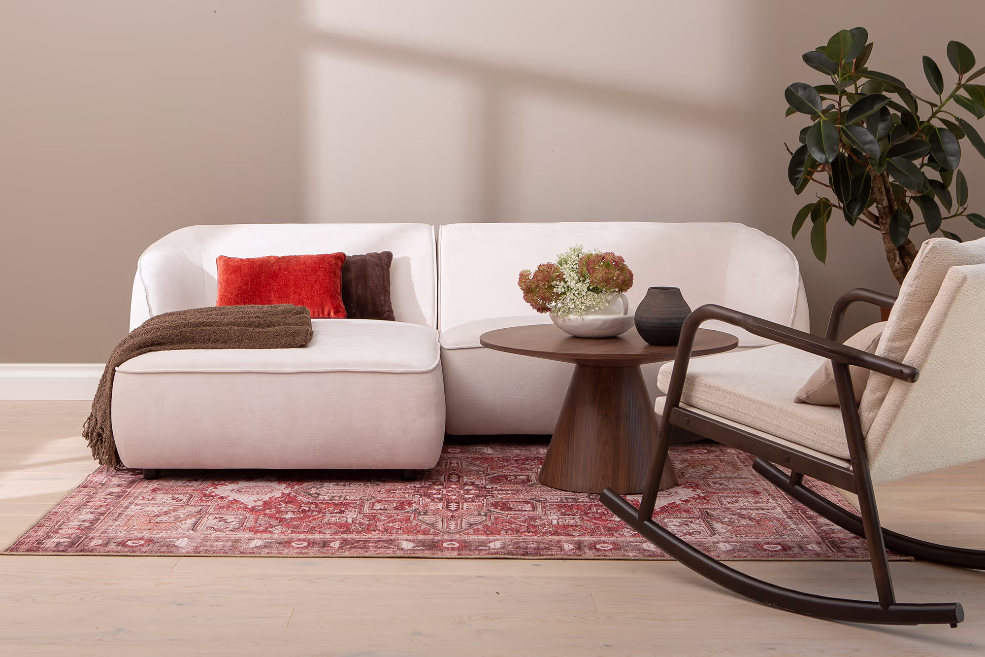 Joy chaise sofa positioned near a window revealing natural light reflection on its white surface