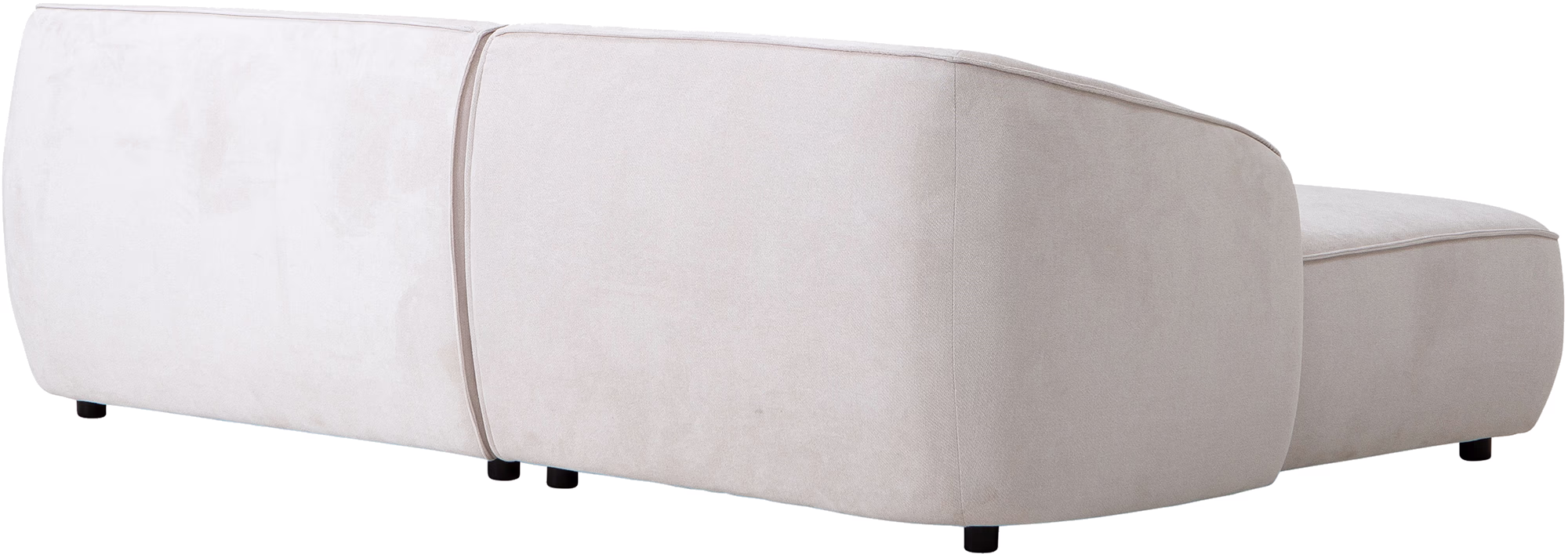 Side angle showing the chaise section and plush cushions of the Joy white sofa with left-handed layout