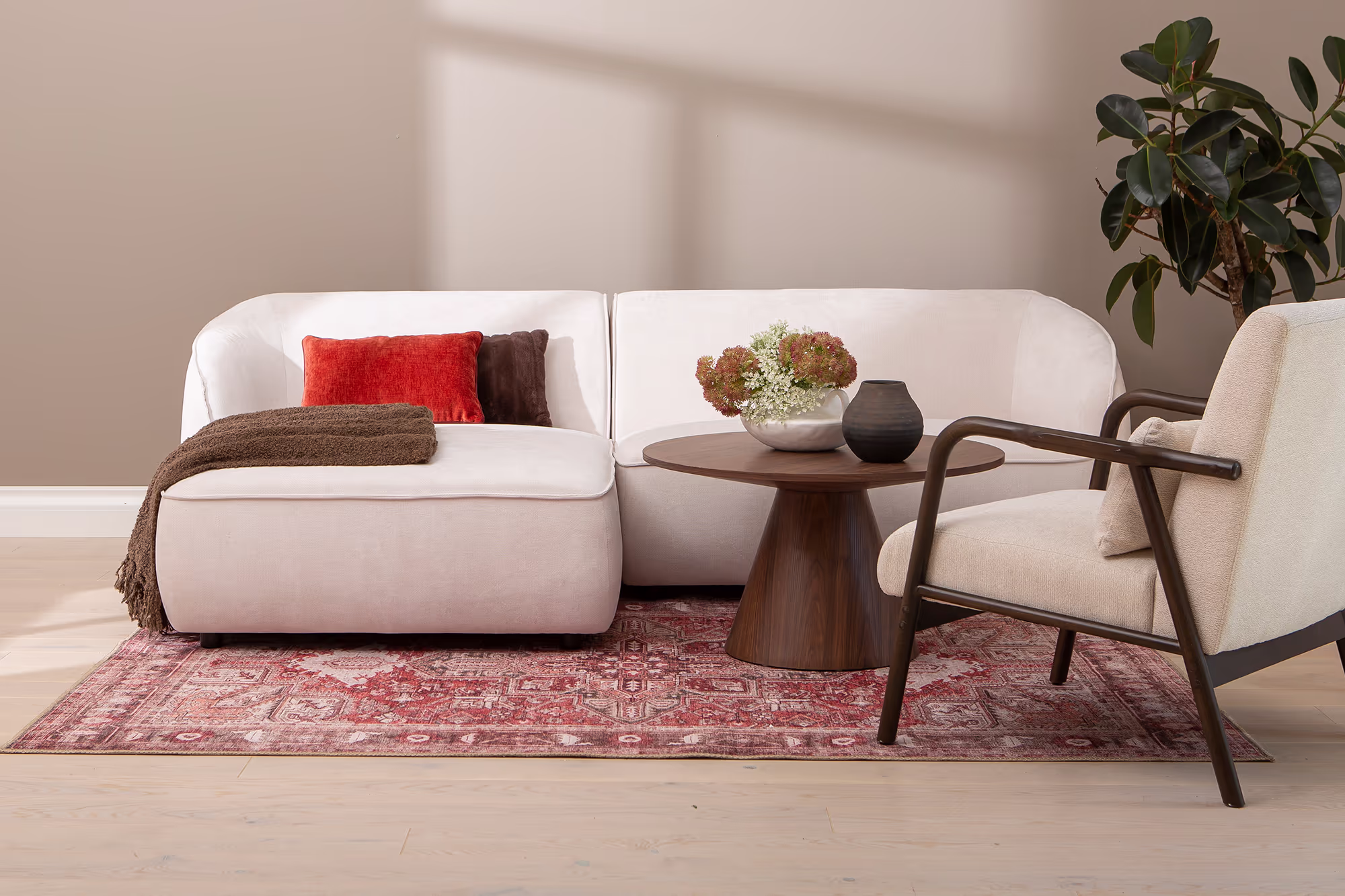 Close-up of the Joy sofa's cushioned seat and backrest with white upholstery
