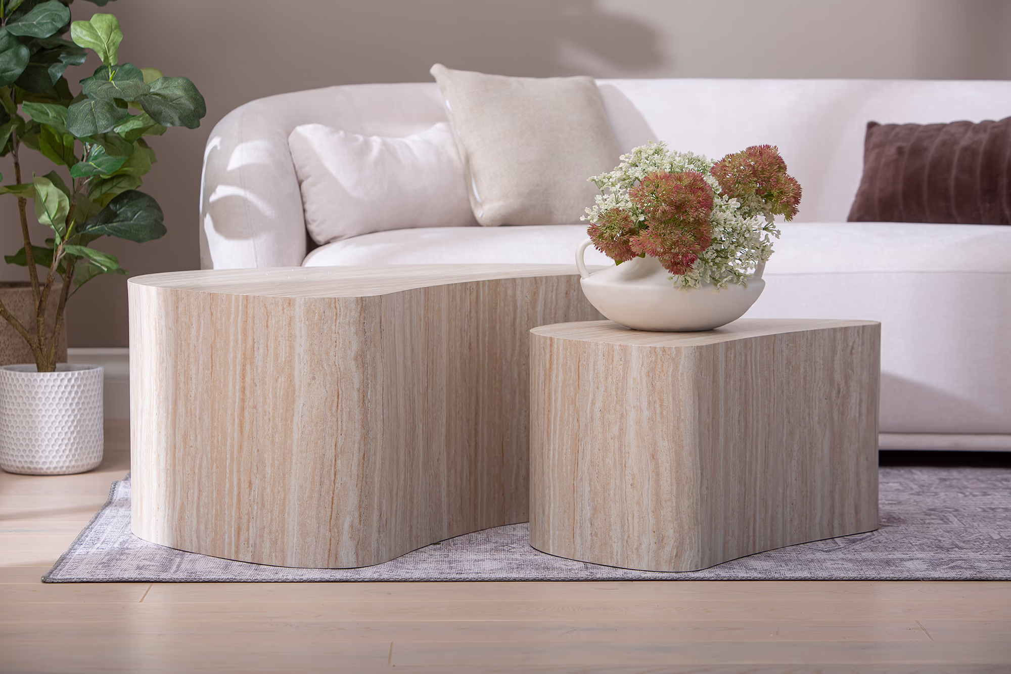 Island series tables styled with neutral tone decor, emphasizing versatility and timeless style.