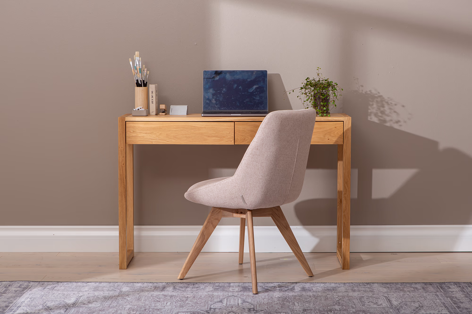 Oak console table drawer partially open revealing spacious interior