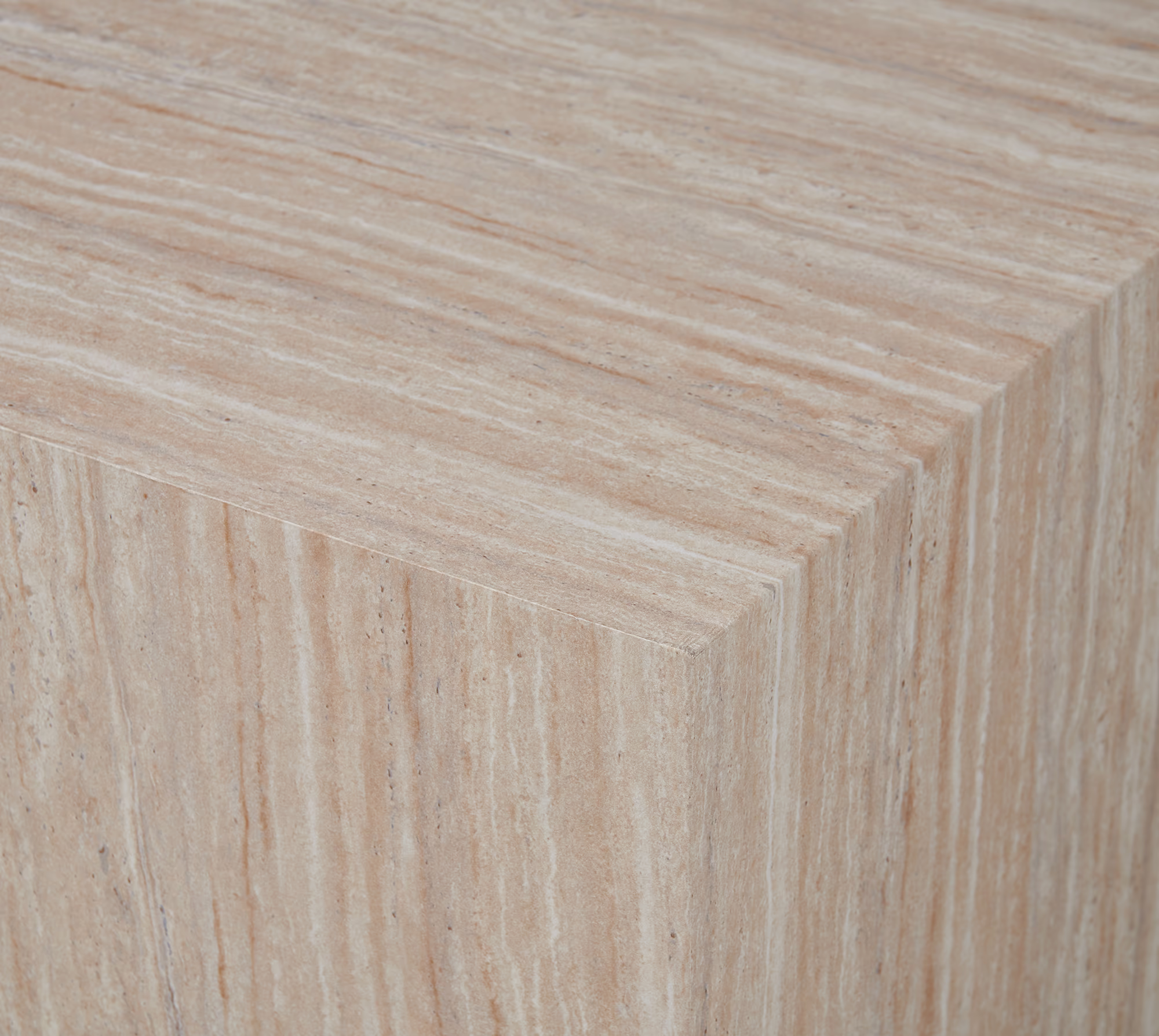 Side angle view of Reef coffee table highlighting the beige color and minimalist design