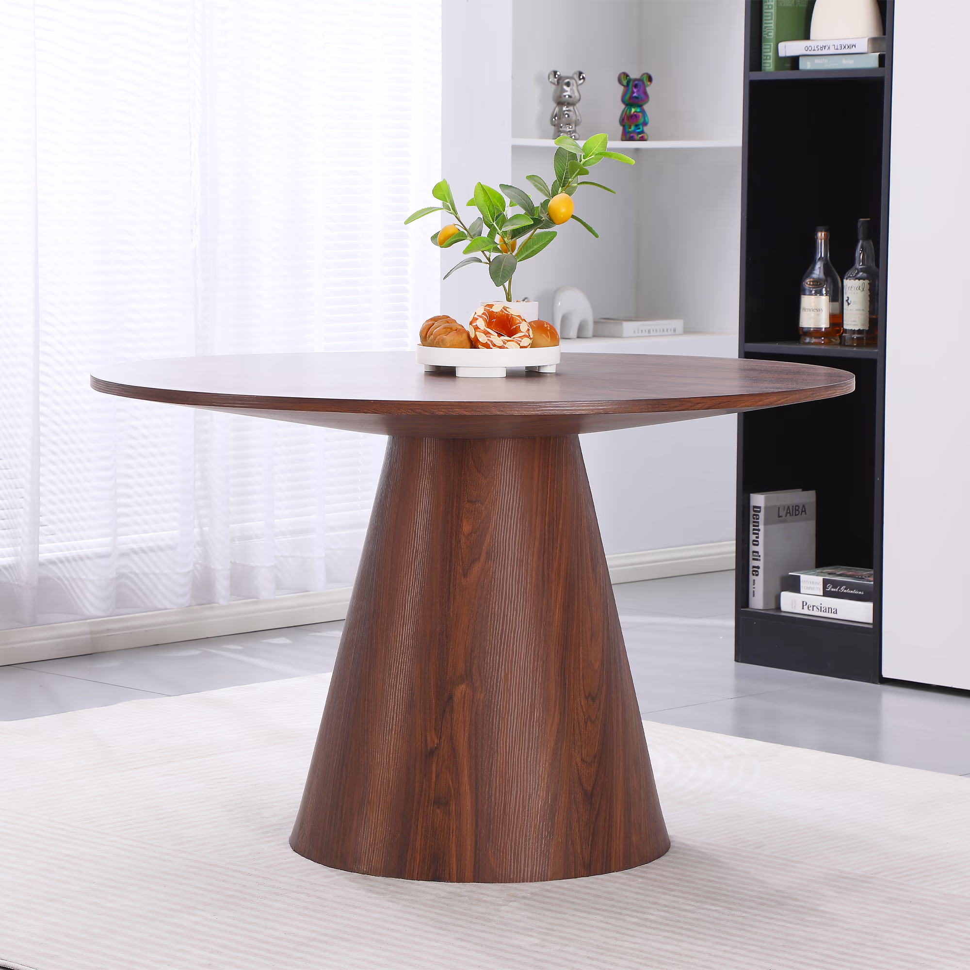 Side angle showing Islet dining table’s balanced proportions and solid construction in walnut and light gray